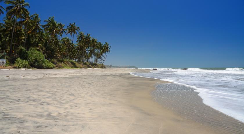 Tiara Fiesta Beach Cottages Morjim Exterior foto